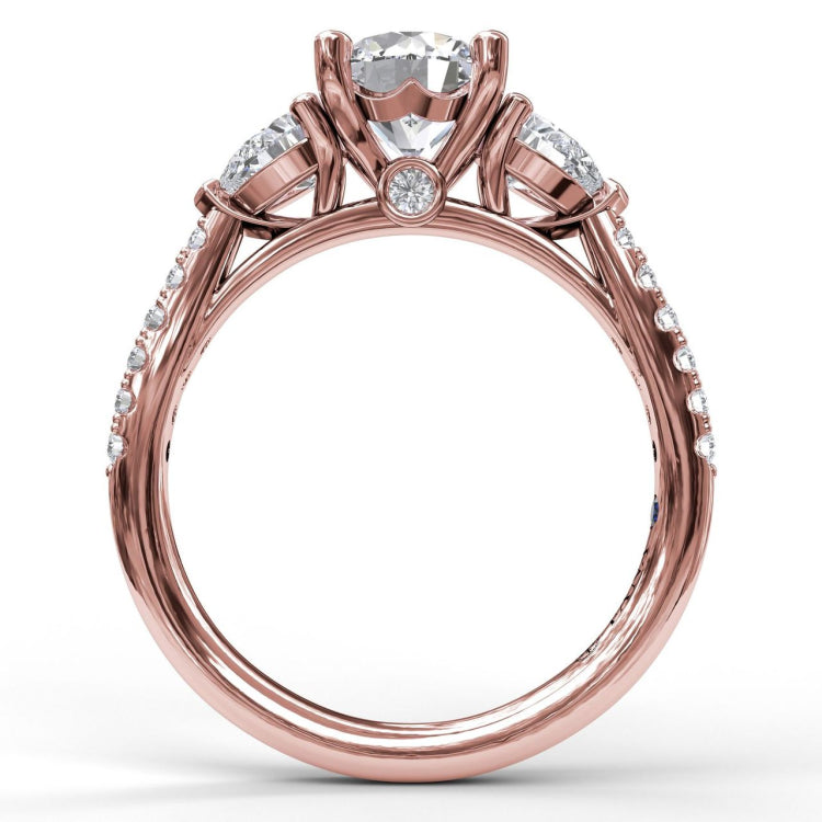 Three-Stone Engagement Ring With Pear Cut Side Stones