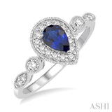 6X4MM Pear shape Sapphire Center and 1/4 Ctw Round Cut Diamond Ring in 14K White Gold