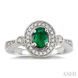 6x4 MM Oval Cut Emerald and 1/5 Ctw Round Cut Diamond Ring in 14K White Gold