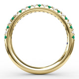 Delicate Emerald Shared Prong Anniversary Band