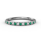Delicate Emerald Shared Prong Anniversary Band