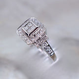 14 Karat White Gold 4 Princess 34 Round= 182 Carat GH VS2-SI1 Ring