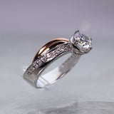 14 Karat White and Rose Gold Engagement Ring 20 Diamonds=.20 Carat Cubic Zirconia Center Angle Shank