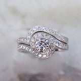 14 Karat White Gold 26 Diamonds=.50 Carat (Engagement) 18 Diamonds=.25 Carat (Band) GH SI1-2 Cubic Zirconia Center with Egnagement Ring