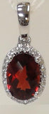 14 Karat White Gold 5X7mm Oval Checkered Garnet20 Diamonds=0.06 Carat Halo Pendant No Chain Included