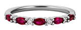 14 Karat White Gold 5 Rubies= .48 Carat 4 Diamonds= .06 Carat Ring Size 7