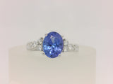 14 Karat White Gold 2.16 Carat Tanzanite 8 Diamonds=.28 Carat GH SI Ring