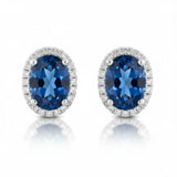 14 Karat White Gold 5X7 Oval Checkboard London Blue Topaz 40 Diamonds=.12 Carat GH SI1-2 Post Earrings