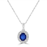 14 Karat White Gold 4.5X5MM Oval Sapphire 20 Diamond=0.10 Carat Halo Pend - No Chain Included