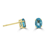 14 Karat Yellow Gold 5X7mm Oval Blue Topaz Earrings