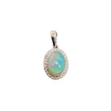 14 Karat White Gold 5X7mm Oval Opal6 Diamonds=.08 Carat Halo Pendant No Chain Included