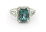 14 Karat White Gold Cushion Cut Created Alexandrite=2.5 Carats
58 Round Diamonds = .31 Carats Size 7