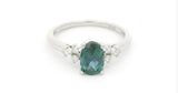 14 Karat White Gold 5x7mm Oval Created Alexandrite 6 Round Diamonds = .11 Carat Size 7 Ring