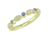 14 Karat Yellow Gold 3 Round Sapphires=.10 Carat 8 Round Diamonds=.16 Carat Size 7 Ring