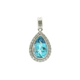 14 Karat White Gold 7x11mm Pear Shaped Blue Topaz 25 Round Diamonds=.19 Carat Pendant Chain Not Included