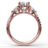 Three-Stone Engagement Ring With Pear Cut Side Stones