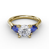 Elegant Pear Sidestone Ring in Sapphire 
