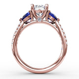 Elegant Pear Sidestone Ring in Sapphire 