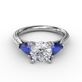 Elegant Pear Sidestone Ring in Sapphire 