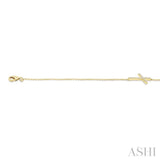 1/8 Ctw Petite Reclined Cross Round Cut Diamond Fashion Bracelet in 10K Yellow Gold