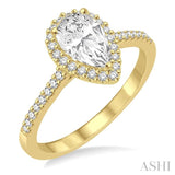 5/8 Ctw Diamond Engagement Ring with 1/3 Ct Pear Shaped Center stone in 14K Yellow Gold