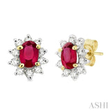 6x4MM Oval Cut Ruby and 1/2 Ctw Round Cut Diamond Earrings in 14K Yellow Gold