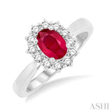 7X5mm Oval Shape Ruby and 1/3 Ctw Round Cut Diamond Ring in 14K White Gold