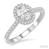 3/4 Ctw Diamond Engagement Ring with 1/2 Ct Oval Cut Center Stone in 14K White Gold