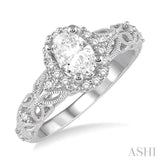 3/4 Ctw Vintage Inspired Diamond Halo Engagement Ring with 1/2 Ct Oval Cut Center Diamond in 14K White Gold